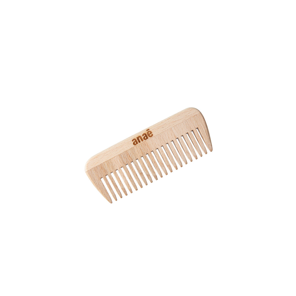 Wooden comb with 'anae' branding on a white background, Clementine Boutique
