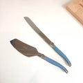 Laguiole Cake Slicer and Bread Knife Set, Pastel Blue Handles on white countertop