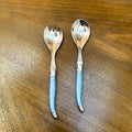 Laguiole Salad Server Set, Pastel Blue Handles on wooden background