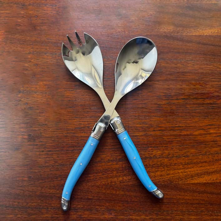 Laguiole Salad Server Set, Pastel Blue Handles on wooden background