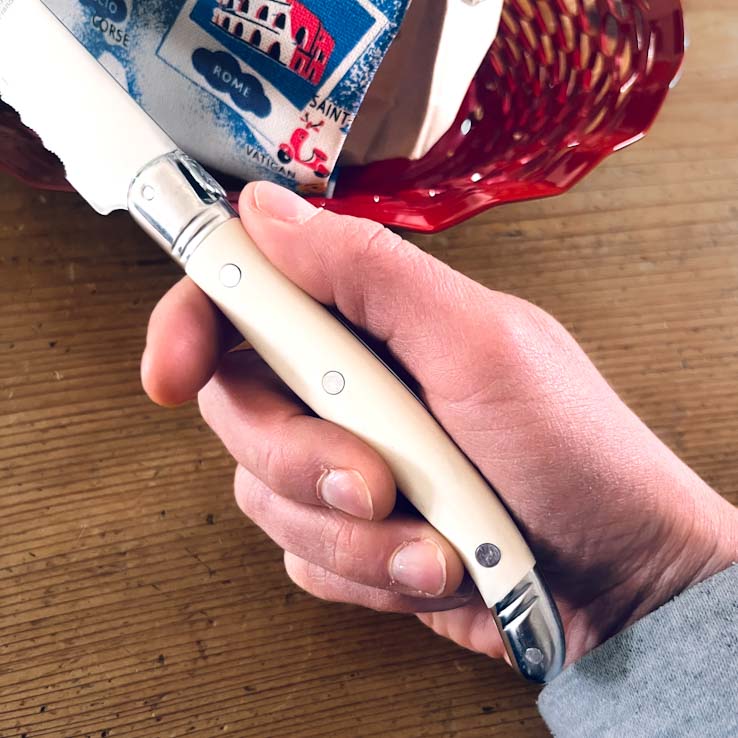 Laguiole Cream Bread knife detail at Clementine Boutique